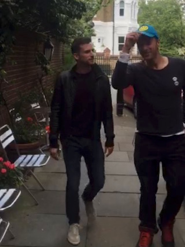 Chris Martin & Guy Berryman of Coldplay marching